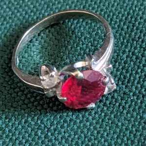 Three Stone Spring 10k ring